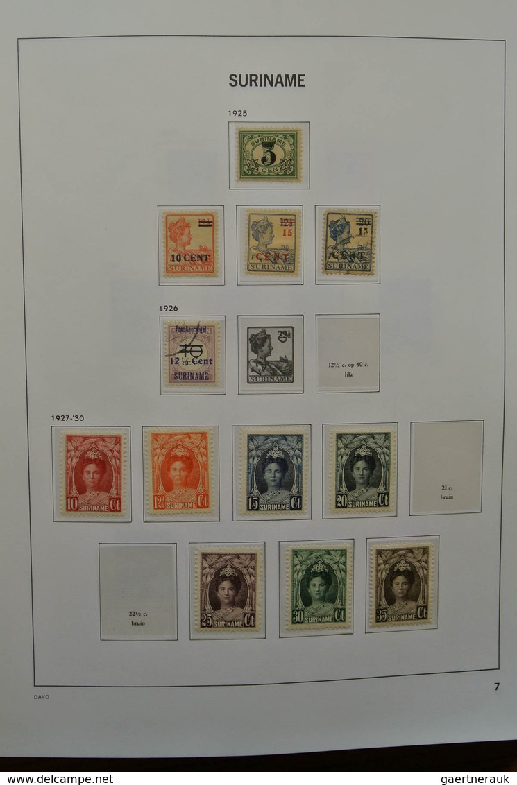 24151 Surinam: 1873-1975. Nicely filled, MNH, mint hinged and used collection Surinam in Davo luxe album.