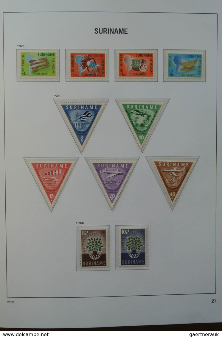 24152 Surinam: 1927-1975. MNH and mint hinged, almost complete collection Surinam 1927-1975 in Davo luxe a