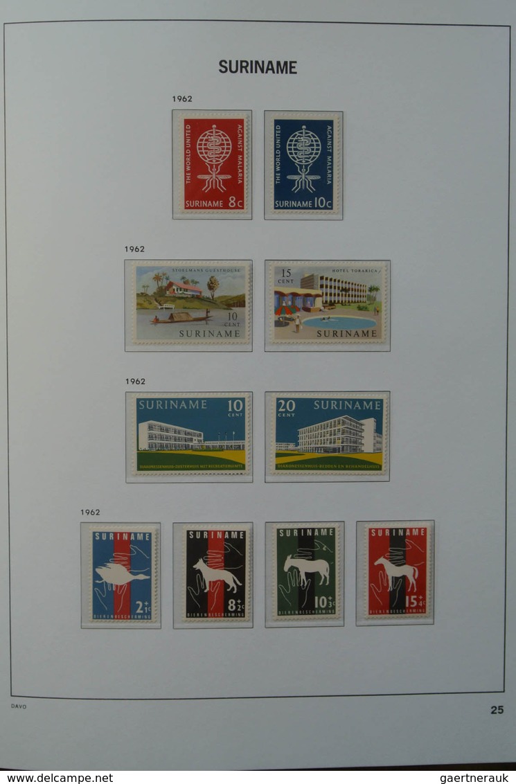 24152 Surinam: 1927-1975. MNH and mint hinged, almost complete collection Surinam 1927-1975 in Davo luxe a