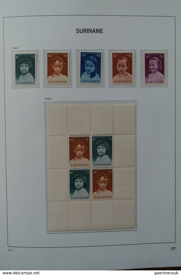 24152 Surinam: 1927-1975. MNH and mint hinged, almost complete collection Surinam 1927-1975 in Davo luxe a