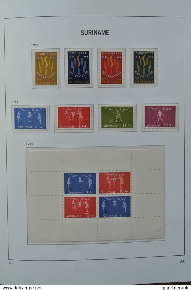 24152 Surinam: 1927-1975. MNH and mint hinged, almost complete collection Surinam 1927-1975 in Davo luxe a