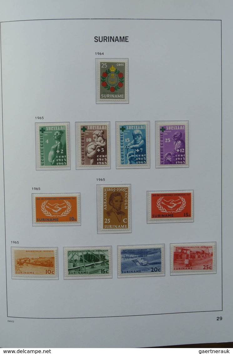 24152 Surinam: 1927-1975. MNH and mint hinged, almost complete collection Surinam 1927-1975 in Davo luxe a