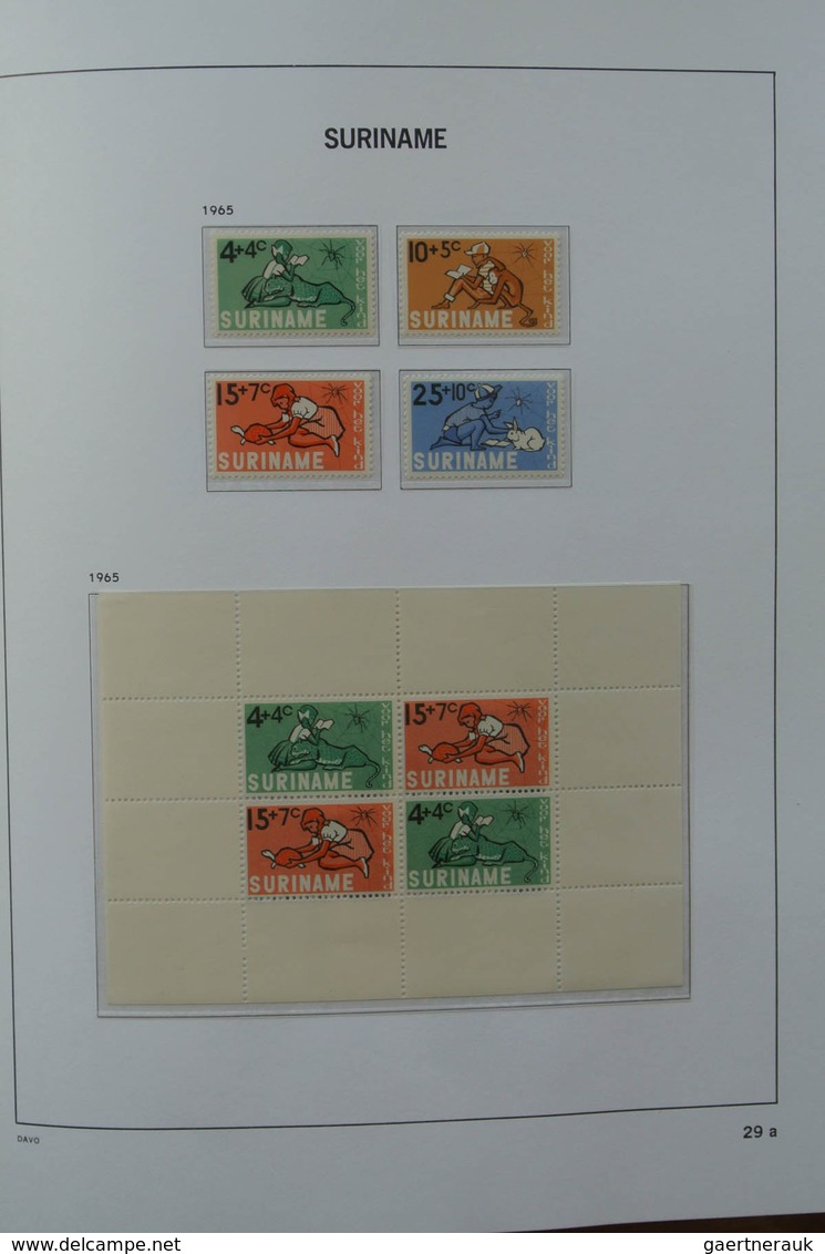 24152 Surinam: 1927-1975. MNH and mint hinged, almost complete collection Surinam 1927-1975 in Davo luxe a