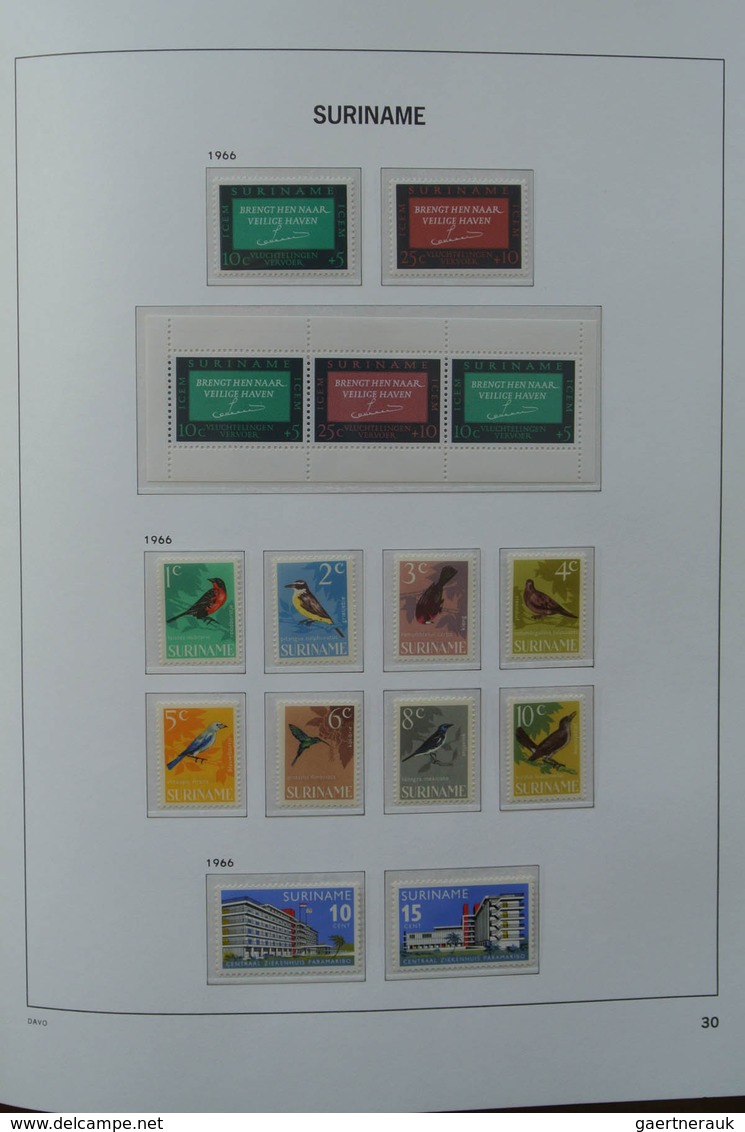 24152 Surinam: 1927-1975. MNH and mint hinged, almost complete collection Surinam 1927-1975 in Davo luxe a