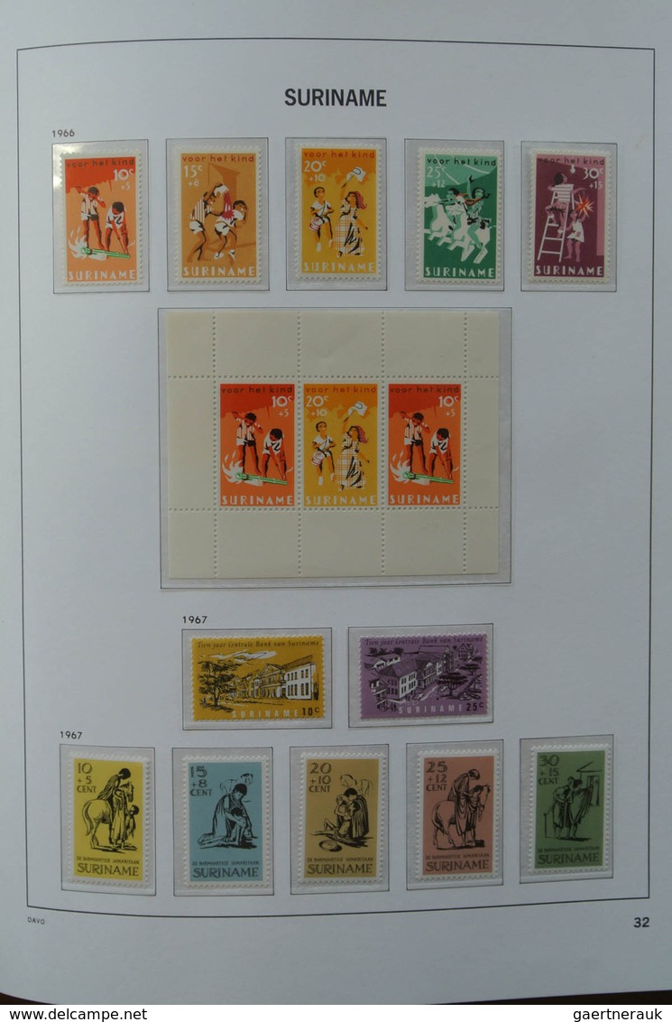 24152 Surinam: 1927-1975. MNH and mint hinged, almost complete collection Surinam 1927-1975 in Davo luxe a