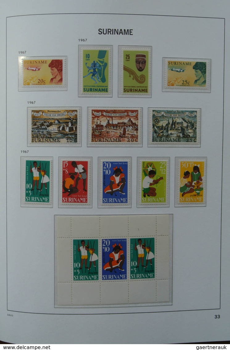 24152 Surinam: 1927-1975. MNH and mint hinged, almost complete collection Surinam 1927-1975 in Davo luxe a