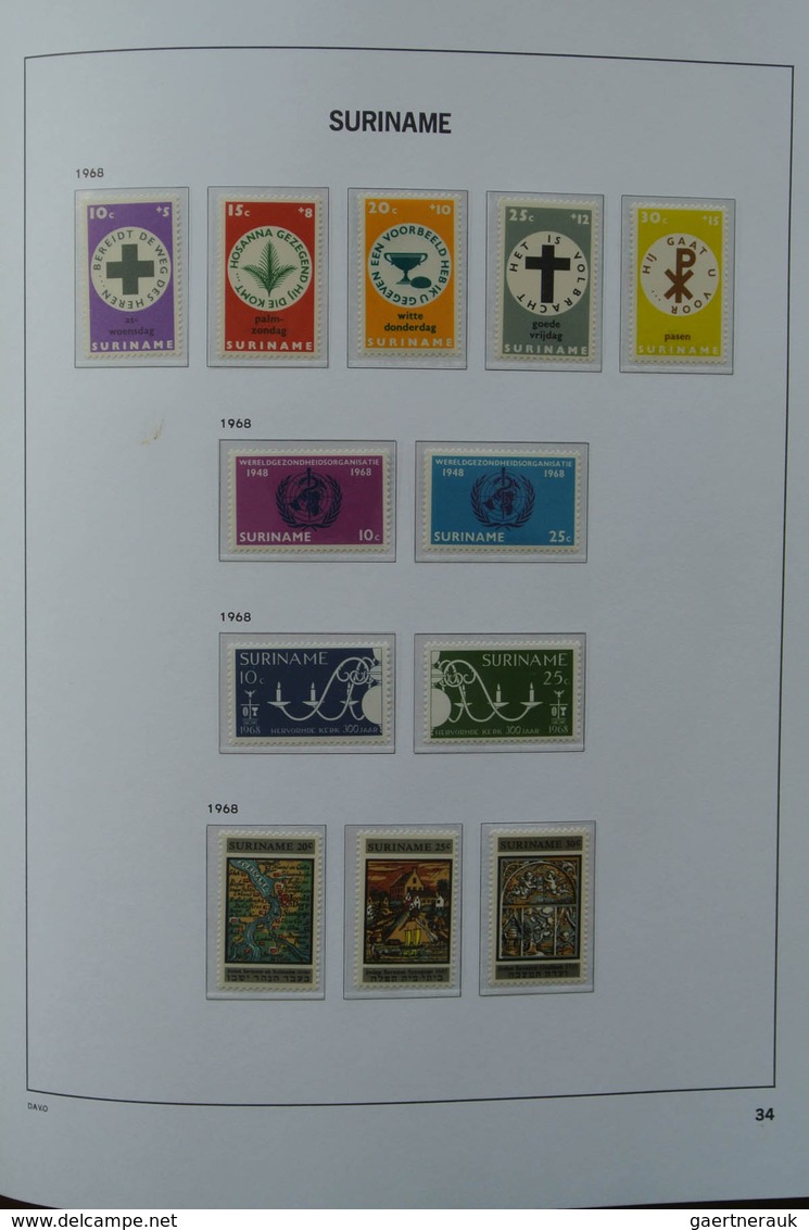 24152 Surinam: 1927-1975. MNH and mint hinged, almost complete collection Surinam 1927-1975 in Davo luxe a