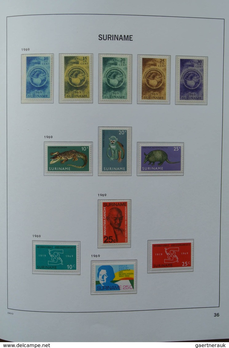 24152 Surinam: 1927-1975. MNH and mint hinged, almost complete collection Surinam 1927-1975 in Davo luxe a