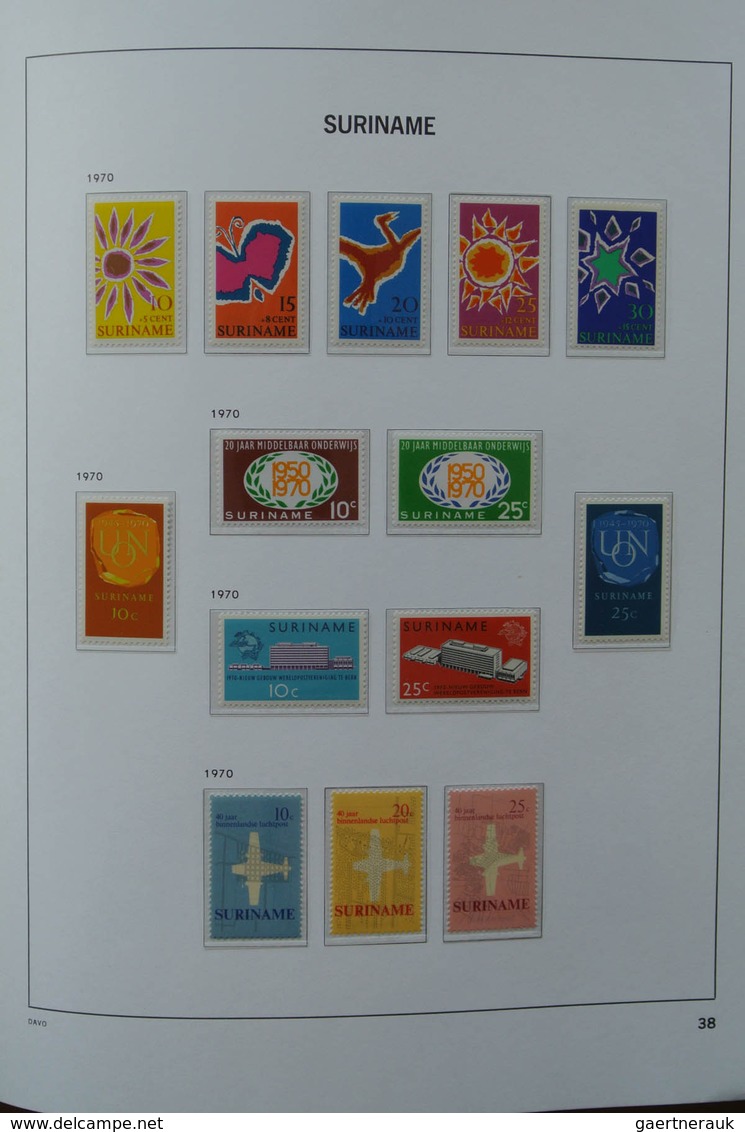 24152 Surinam: 1927-1975. MNH and mint hinged, almost complete collection Surinam 1927-1975 in Davo luxe a