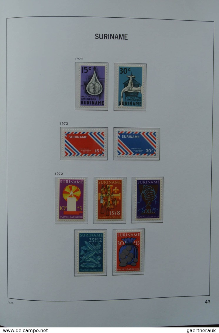 24152 Surinam: 1927-1975. MNH and mint hinged, almost complete collection Surinam 1927-1975 in Davo luxe a