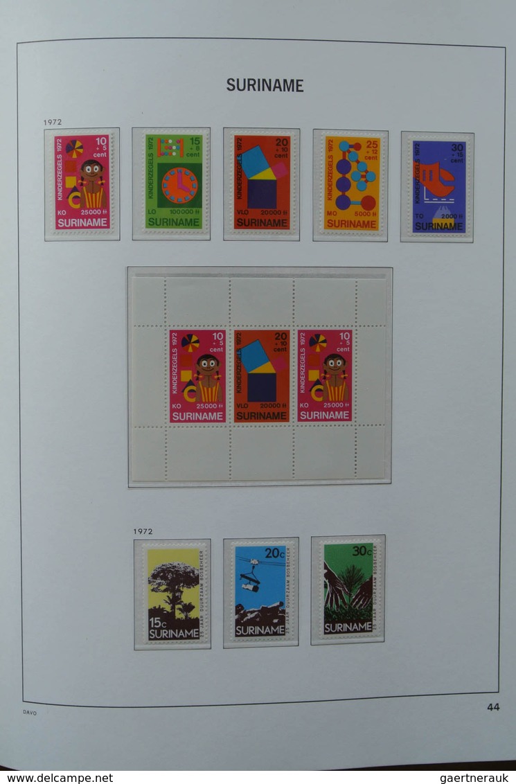 24152 Surinam: 1927-1975. MNH and mint hinged, almost complete collection Surinam 1927-1975 in Davo luxe a