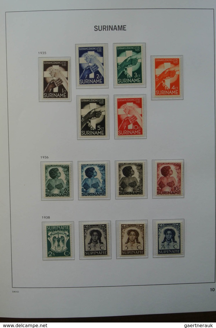 24152 Surinam: 1927-1975. MNH and mint hinged, almost complete collection Surinam 1927-1975 in Davo luxe a