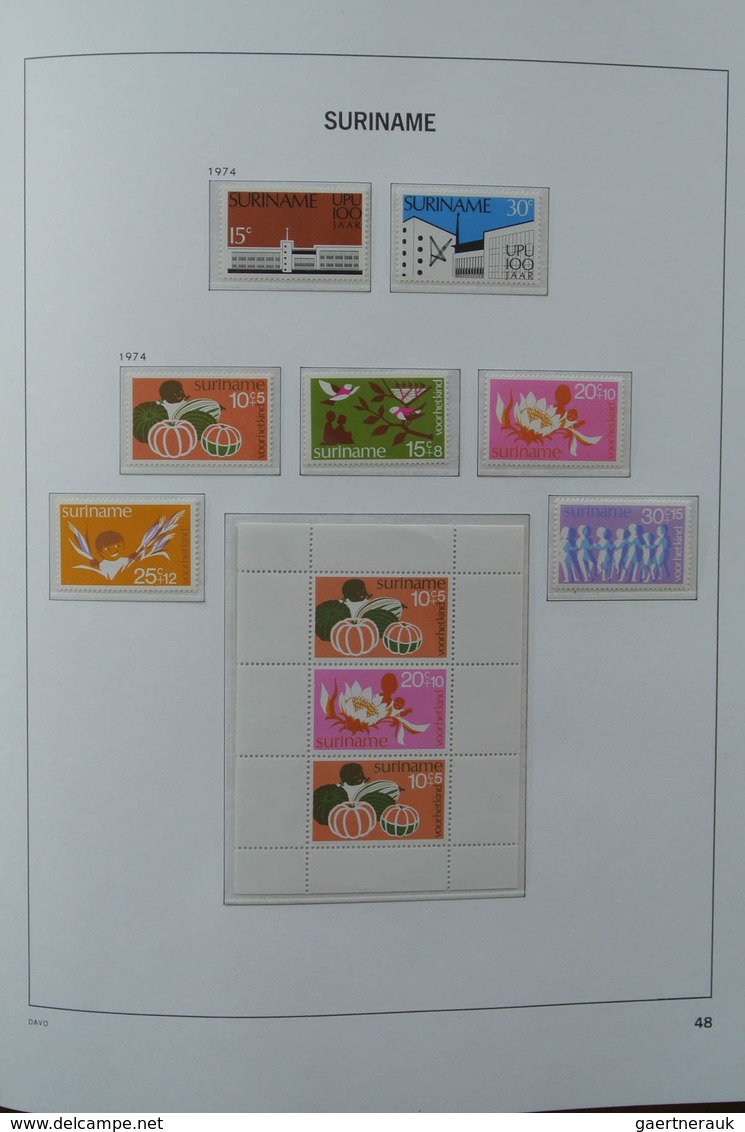 24152 Surinam: 1927-1975. MNH and mint hinged, almost complete collection Surinam 1927-1975 in Davo luxe a
