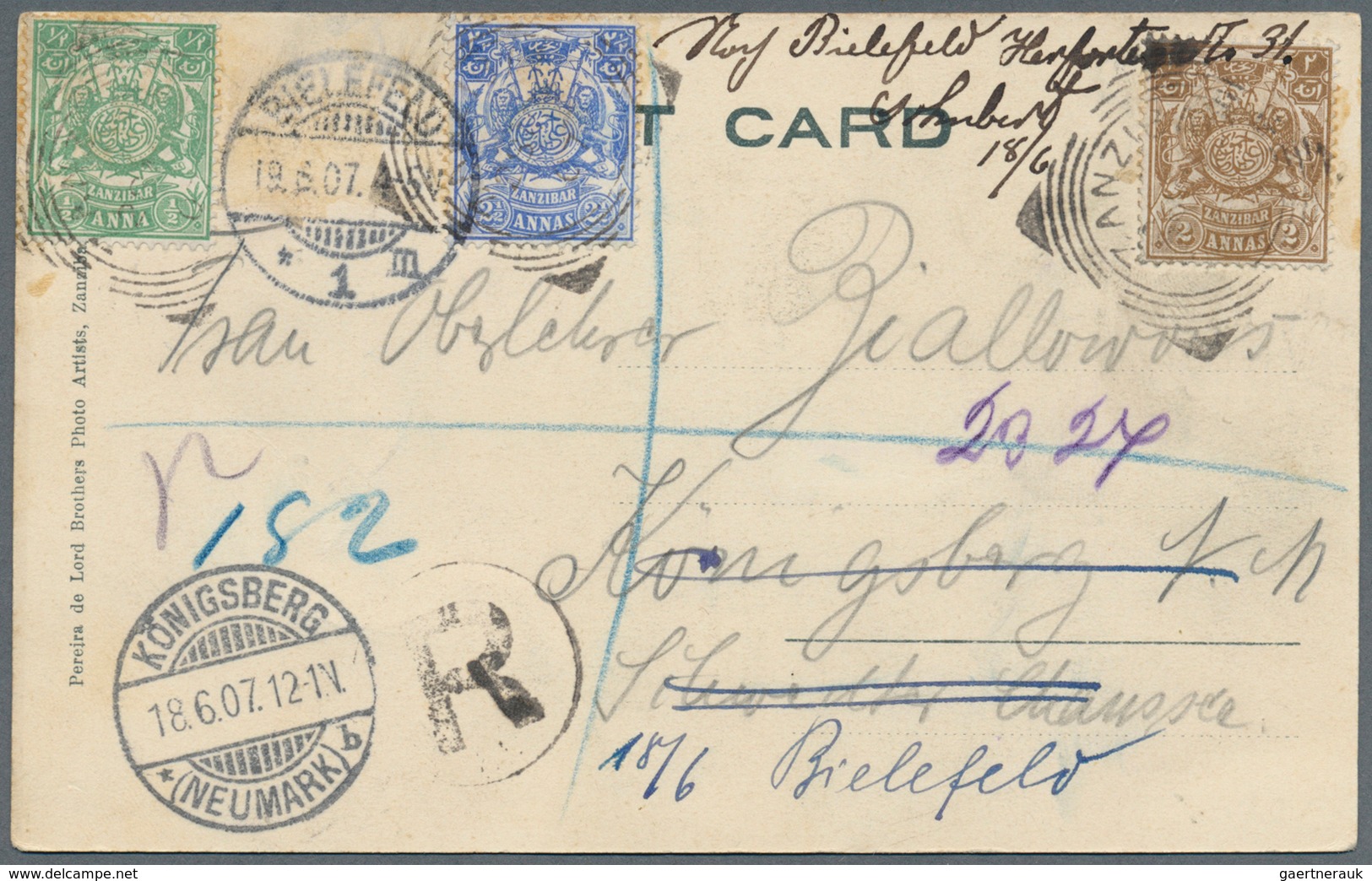 24460 Zanzibar: 1903 - 1911, Four Covers And One Postal Stationery Envelope With Uprated Franking, Interes - Zanzibar (...-1963)