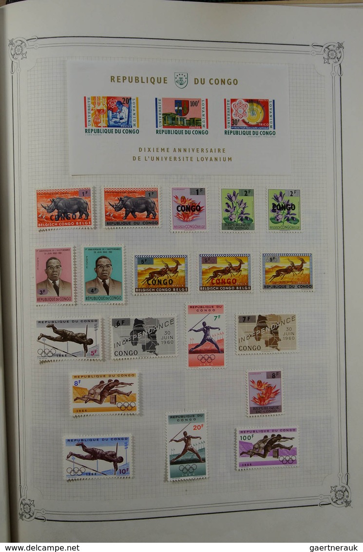 26097 Belgien: 1886-1964. Nicely filled, mint hinged and used collection Belgian territories 1886-1964 in