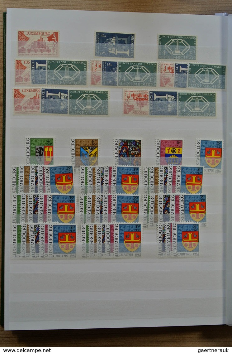 27279 Luxemburg: 1931-1982. Fantastic mint never hinged lot better sets and sheetlets, mainly very good co