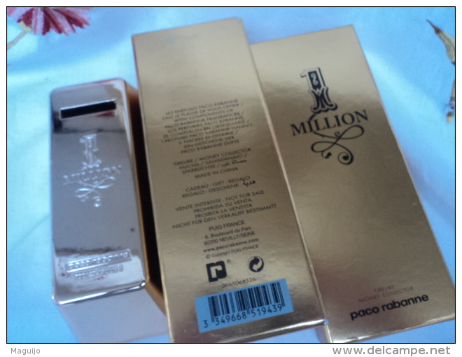 PACO RABANNE " ONE MILLION'  TIRELIRE  SIGLEE  + BOITE  LIRE ET VOIR!! - Miniatures Femmes (avec Boite)