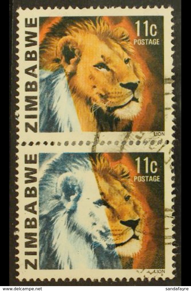 1980 LION 11C - IMPRESSIVE MISSING COLOUR PAIR 11c Lion, SG 582, Vertical Pair, Showing Large Area Of Colours Missing, W - Zimbabwe (1980-...)