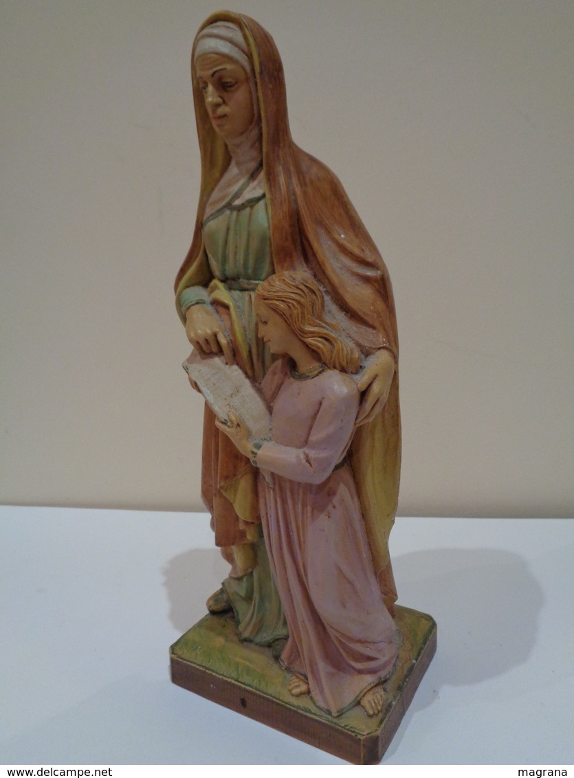 Escultura religiosa de Santa Ana enseñando a leer a la Virgen María. Realizada en Italia.