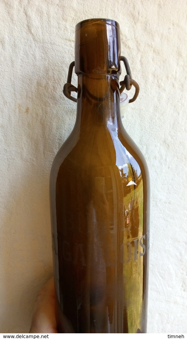 BIERE LA GAULOISE - vieille bouteille en verre épais brun 1kg - gravé BIERE LA GAULOISE - bouchon porcelaine estampillé