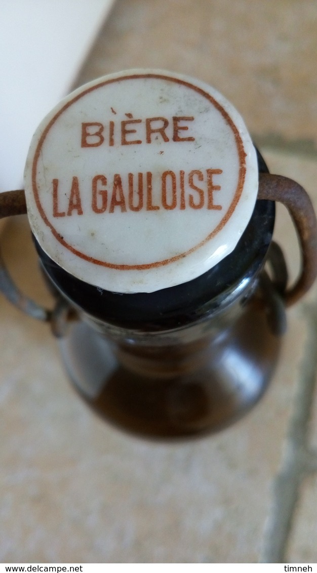 BIERE LA GAULOISE - vieille bouteille en verre épais brun 1kg - gravé BIERE LA GAULOISE - bouchon porcelaine estampillé