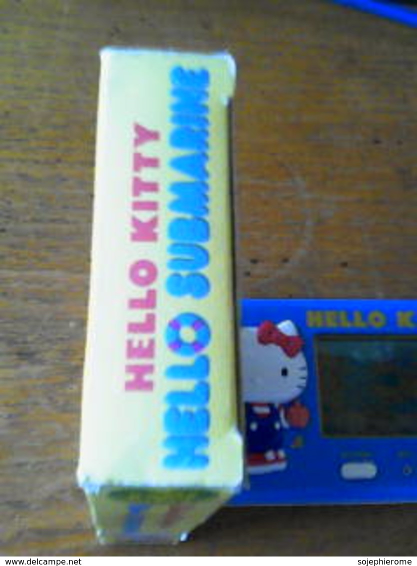 jeu électronique qui ne fonctionne pas Hello Kitty de Tomy Sanrio 1976 + boîte + pochette + BD en japonais 16 photos