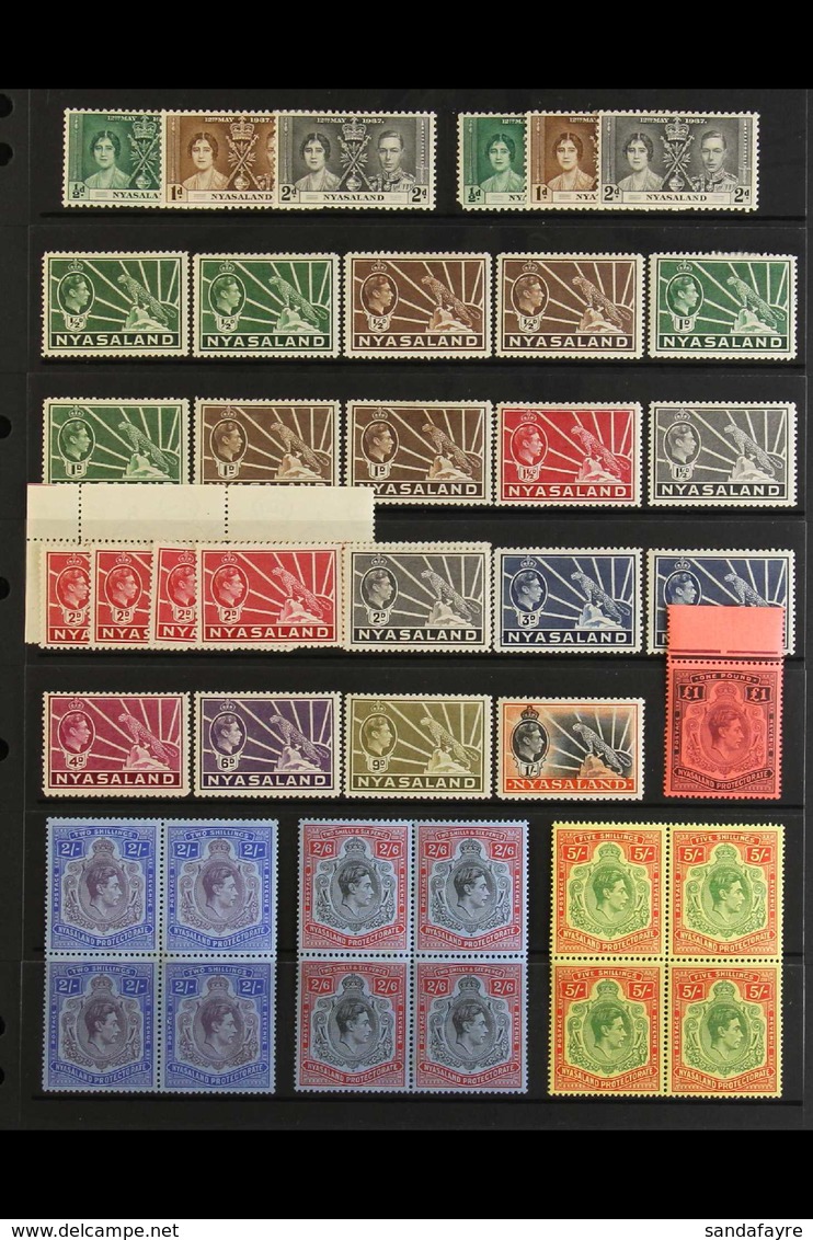 1937-51 KGVI MINT / NHM HOARD. A Small Accumulation Stuffed Onto A Pair Of Stock Pages That Includes All Omnibus Sets, 1 - Nyassaland (1907-1953)