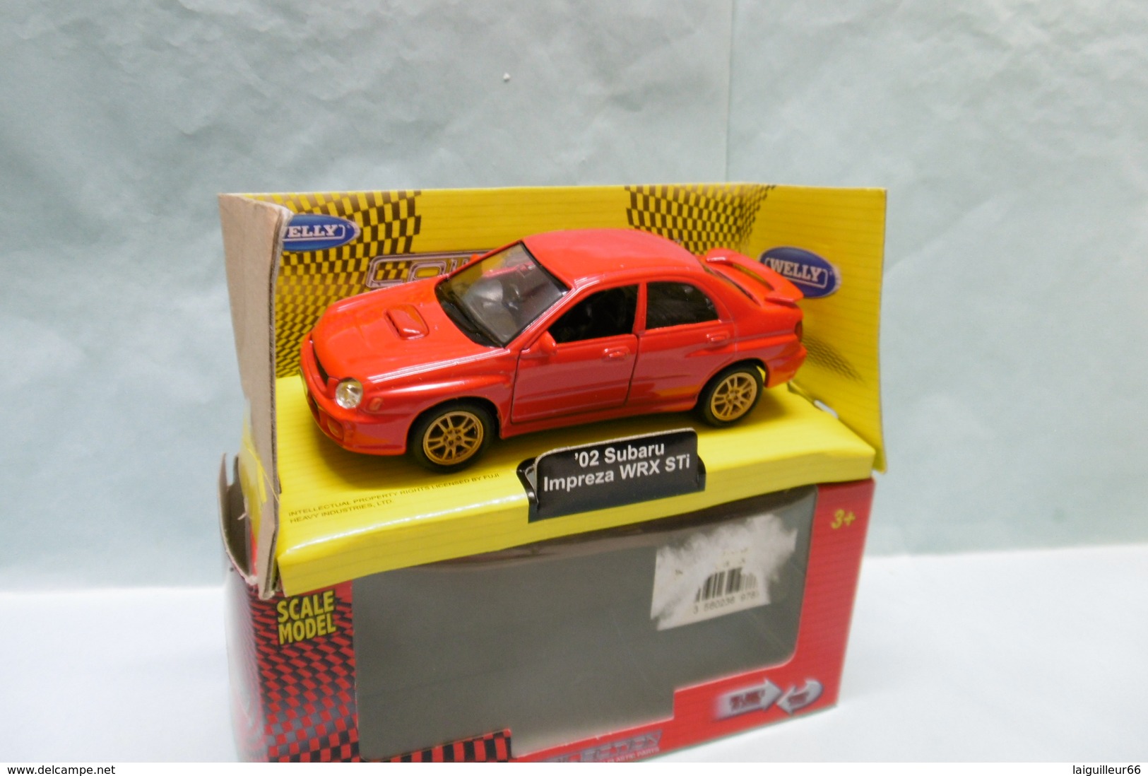 Welly - SUBARU IMPREZA WRX STI 2002 Rouge Réf. 697871 BO 1/38 - Welly