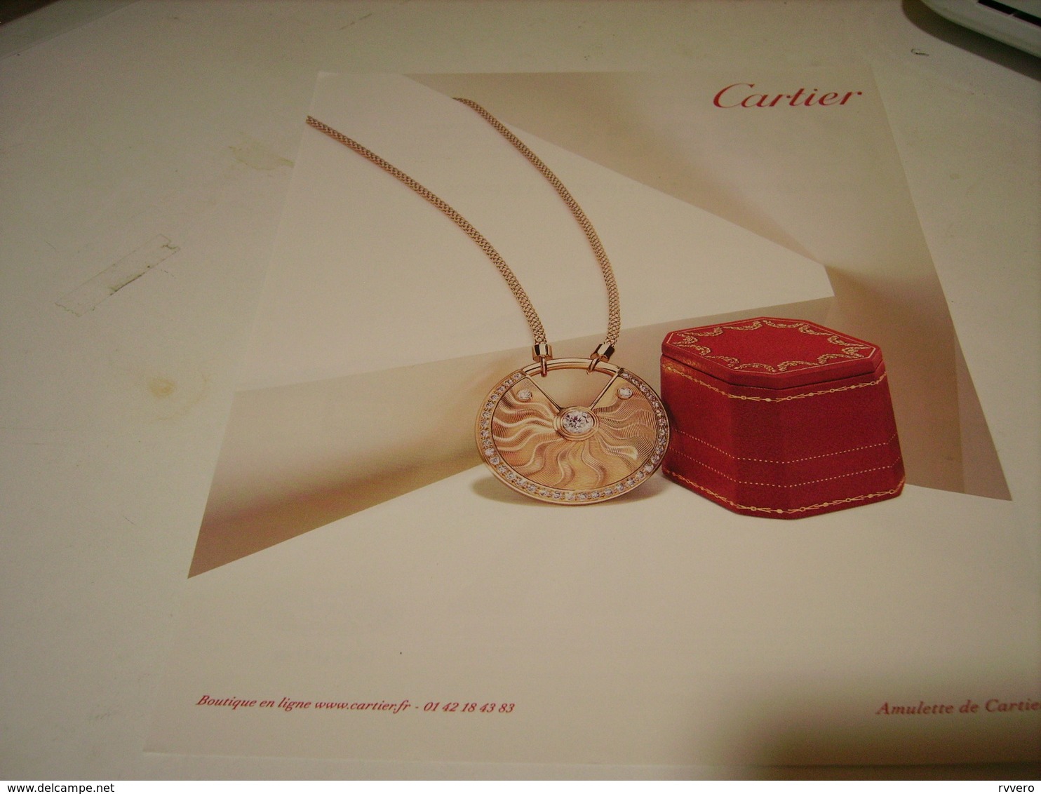 ANCIENNE PUBLICITE JOAILLIER  CARTIER AMULETTE 2009 - Andere & Zonder Classificatie