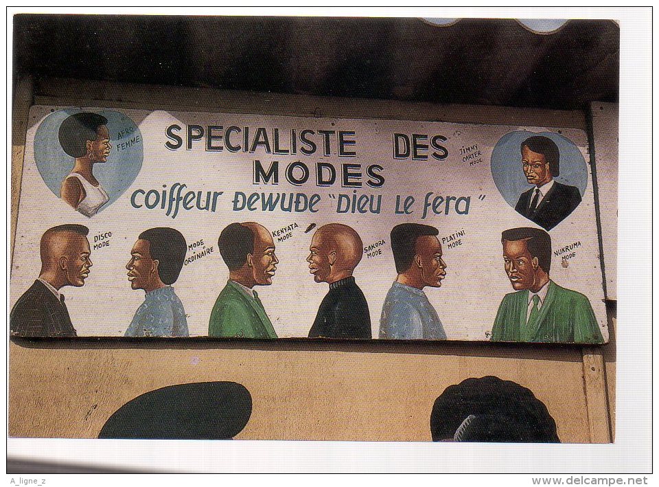 REF 331 :  CPM COTE D'IVOIRE Les Enseignes Uwe Ommer Coiffeur Spécialiste Des Modes - Côte-d'Ivoire