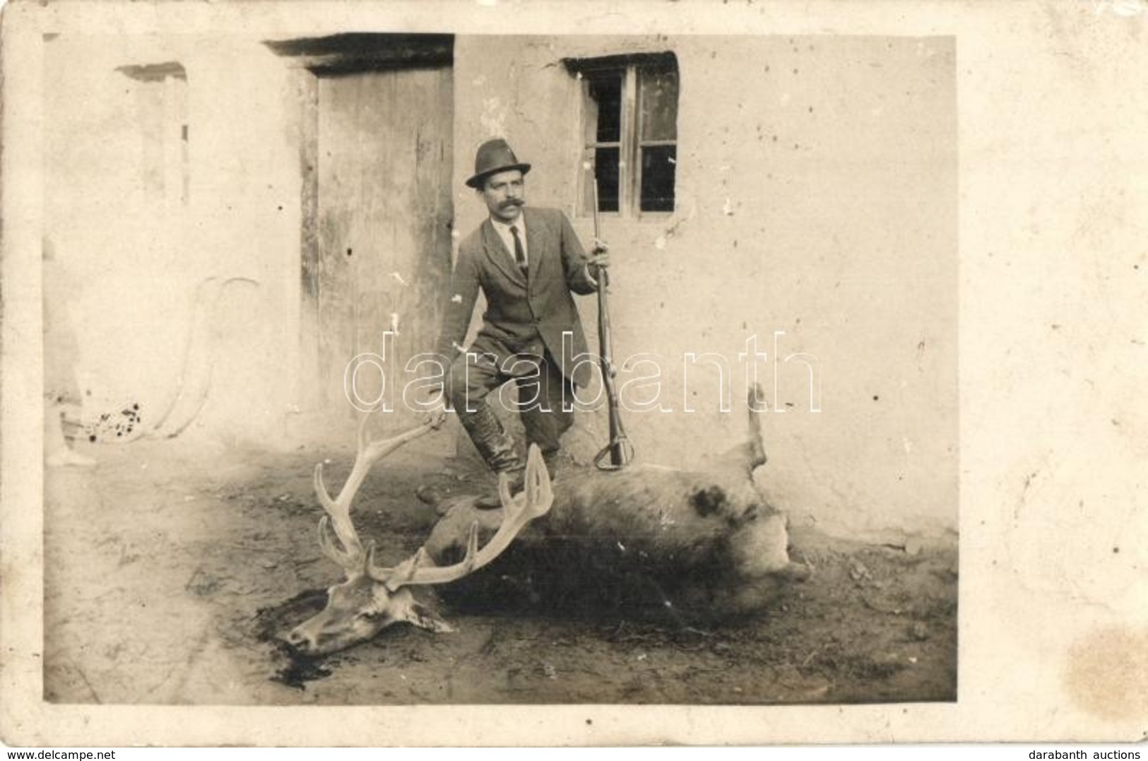 ** T2/T3 Hunter With Hunted Deer. Photo  (fl) - Unclassified