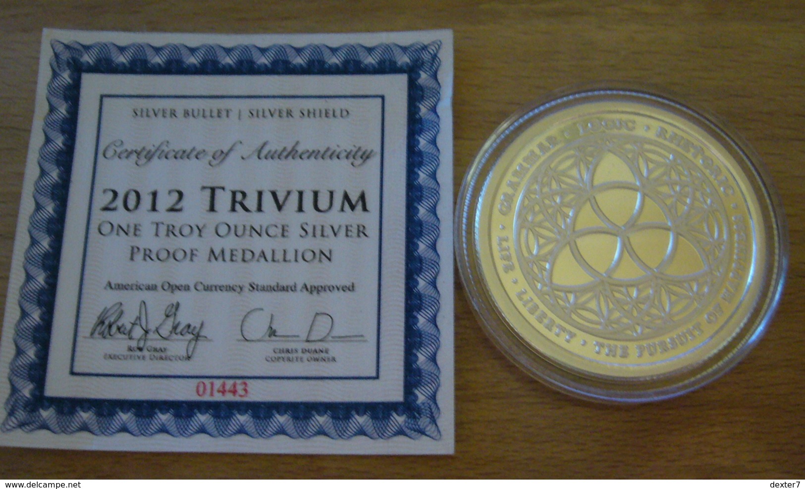 USA United States, Chris Duane Silver Shield TRIVIUM 2012 PROOF 1 Oz Pure Silver - 1 Oncia Argento Stati Uniti - Collezioni