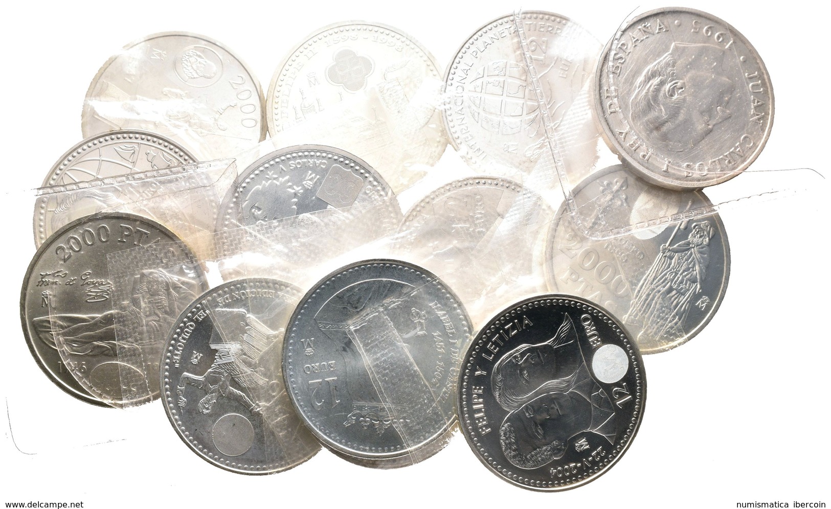 JUAN CARLOS I. Conjunto De 13 Monedas De 2000 Pesetas Y 12 Euros De 1995 A 2010, Todas Diferentes Presentadas En Blíster - Other & Unclassified