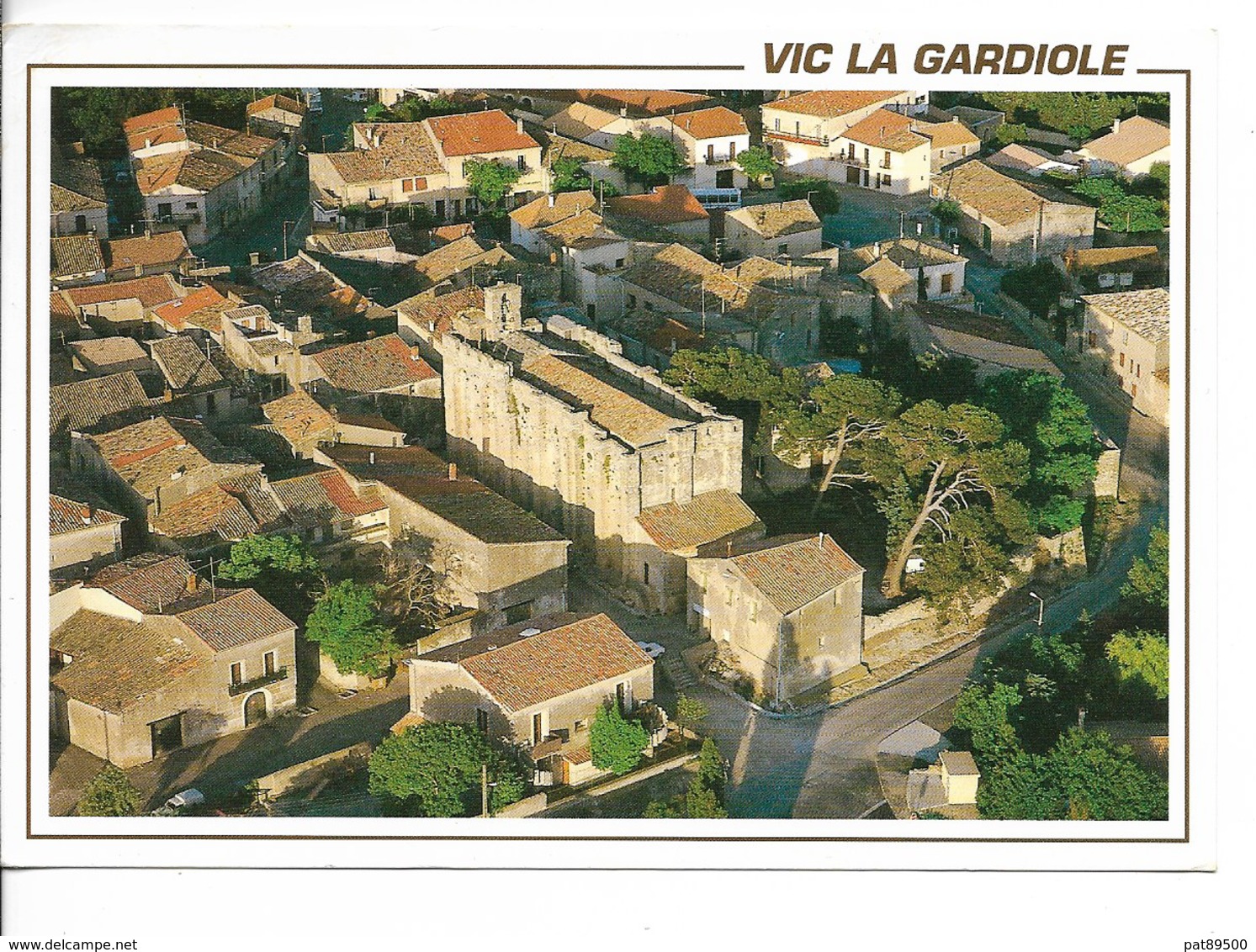 34 VIC LA GARDIOLE : L 'Eglise Fortifiée XIIème Siècle / CPM E.M. Voyagée 1994 / TBE - Other & Unclassified