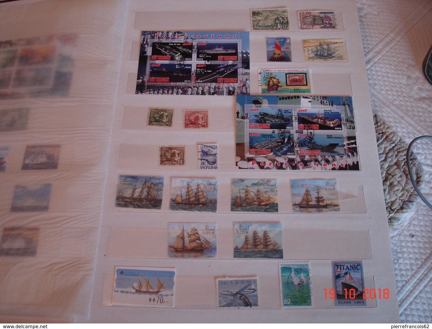 ALBUM CONTENANT COLLECTION DE TIMBRES SUR LES BATEAUX DU MONDE