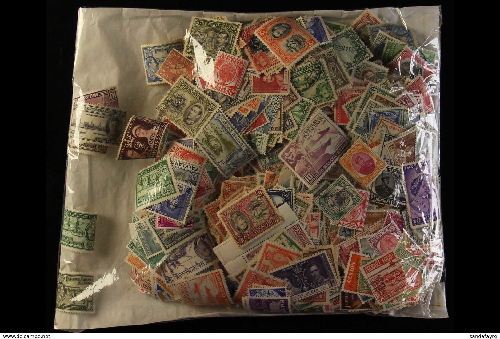 BRITISH COMMONWEALTH - KGVI A Film Fronted Packet Containing An Estimated 3000+ Mint & Used Stamps From A Plethora Of Co - Sonstige & Ohne Zuordnung