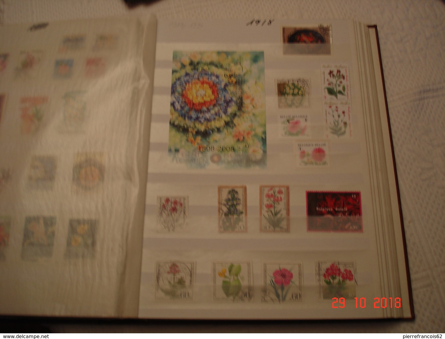 ALBUM CONTENANT BELLE COLLECTION DE TIMBRES SUR LES FLEURS DANS LE MONDE