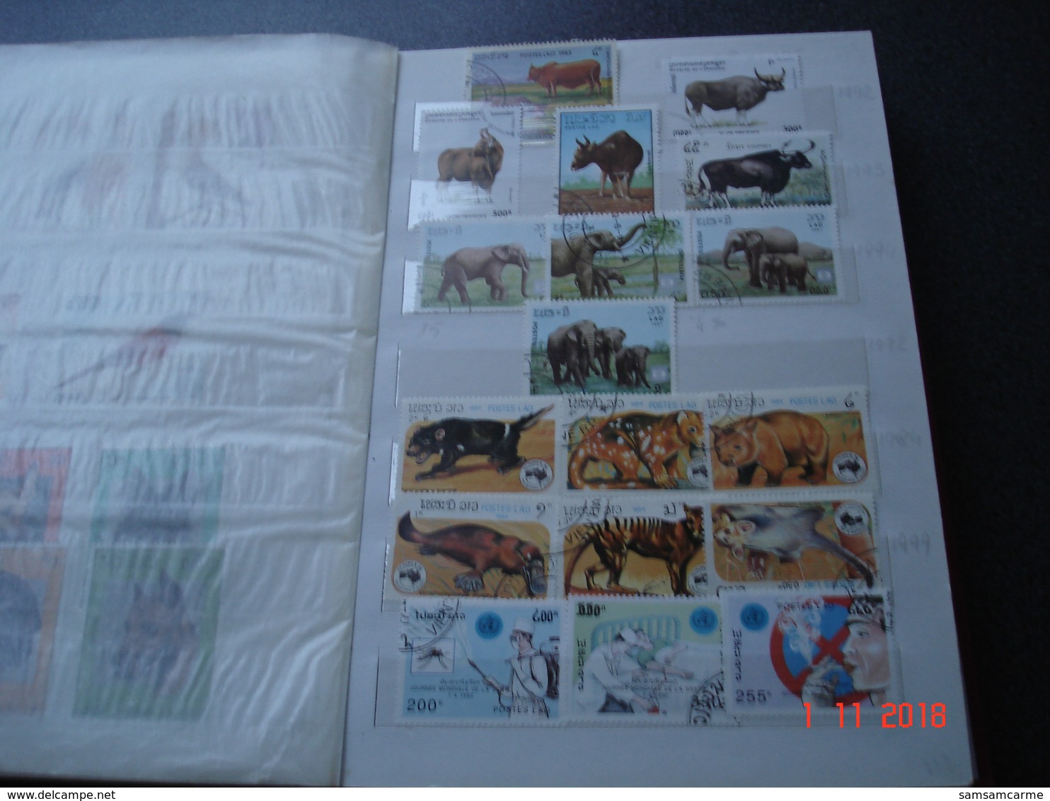 ALBUM AVEC PETITE COLLECTION DE TIMBRES SUR THEMATIQUES DIVERSES