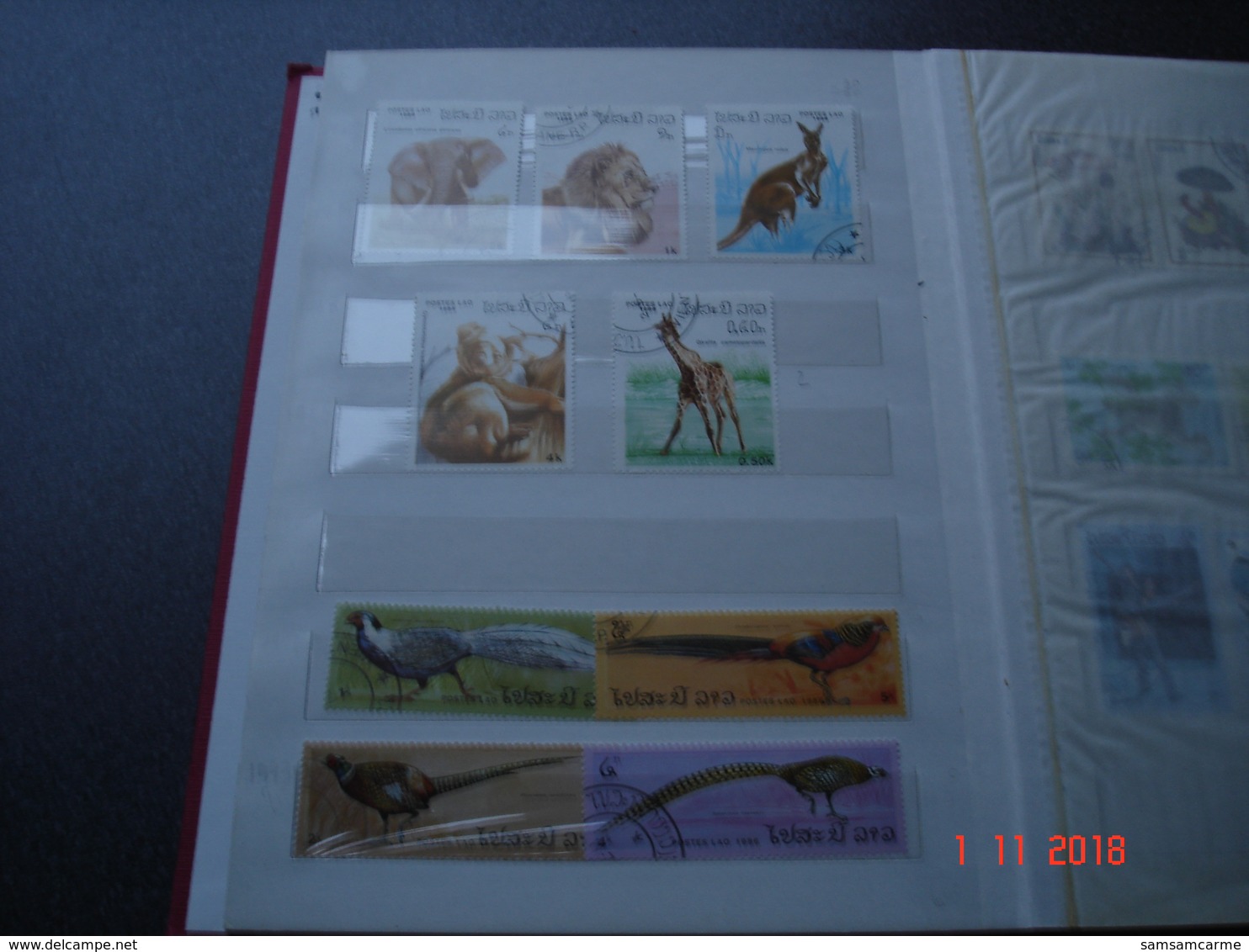 ALBUM AVEC PETITE COLLECTION DE TIMBRES SUR THEMATIQUES DIVERSES