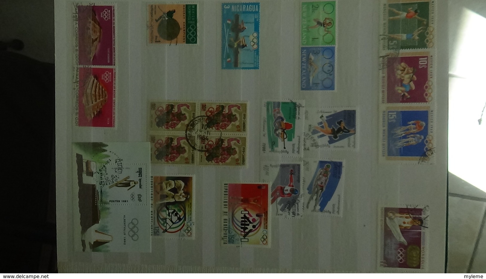 Gros album de thématiques Jeux Olympiques en timbres et blocs tous pays