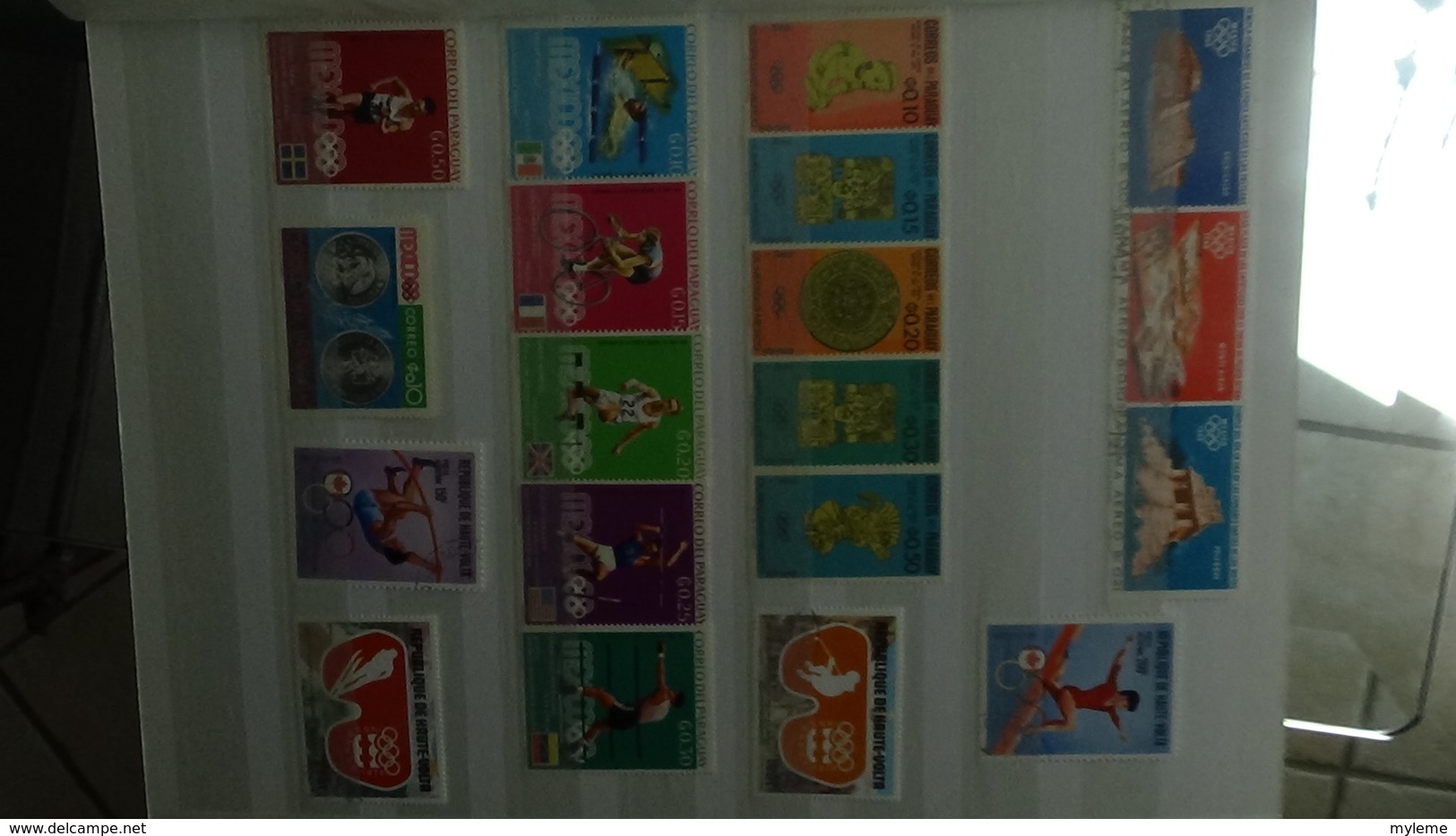 Gros album de thématiques Jeux Olympiques en timbres et blocs tous pays