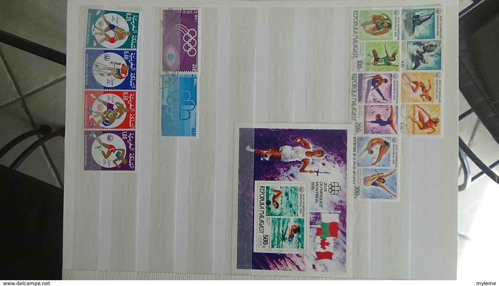 Gros album de thématiques Jeux Olympiques en timbres et blocs tous pays