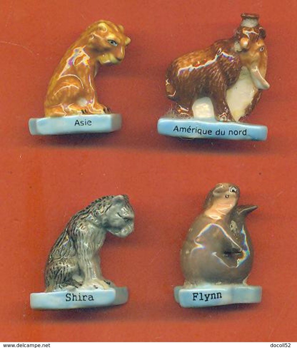 Lot De 4 Feves Porcelaine De La Serie Animaux Prehistoriques - Animaux