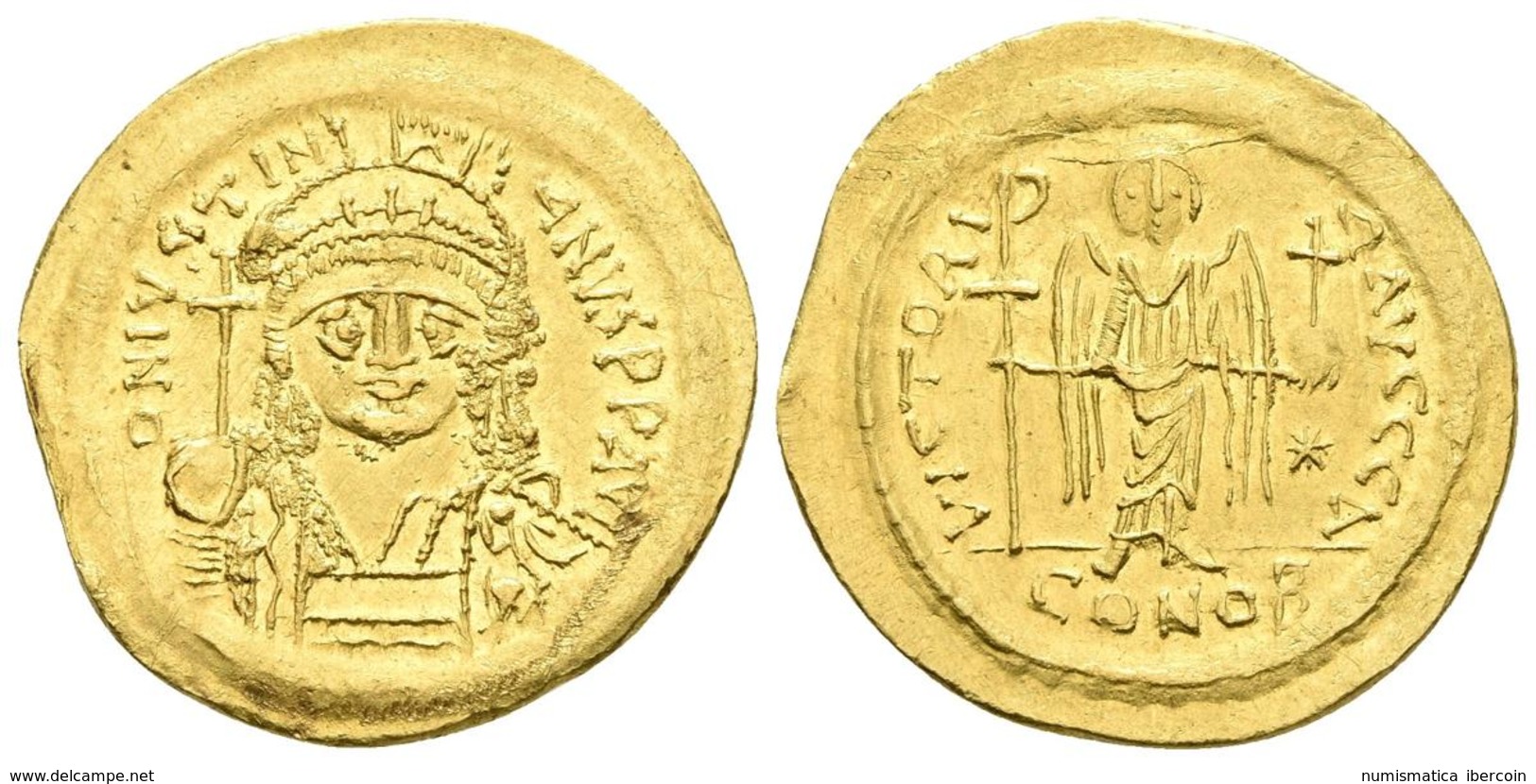 JUSTINIANO I. Sólido. 527-565 D.C. Constantinopla. A/ Busto Con Casco Y Coraza De Frente Sosteniendo Globo Crucífero Y E - Byzantine