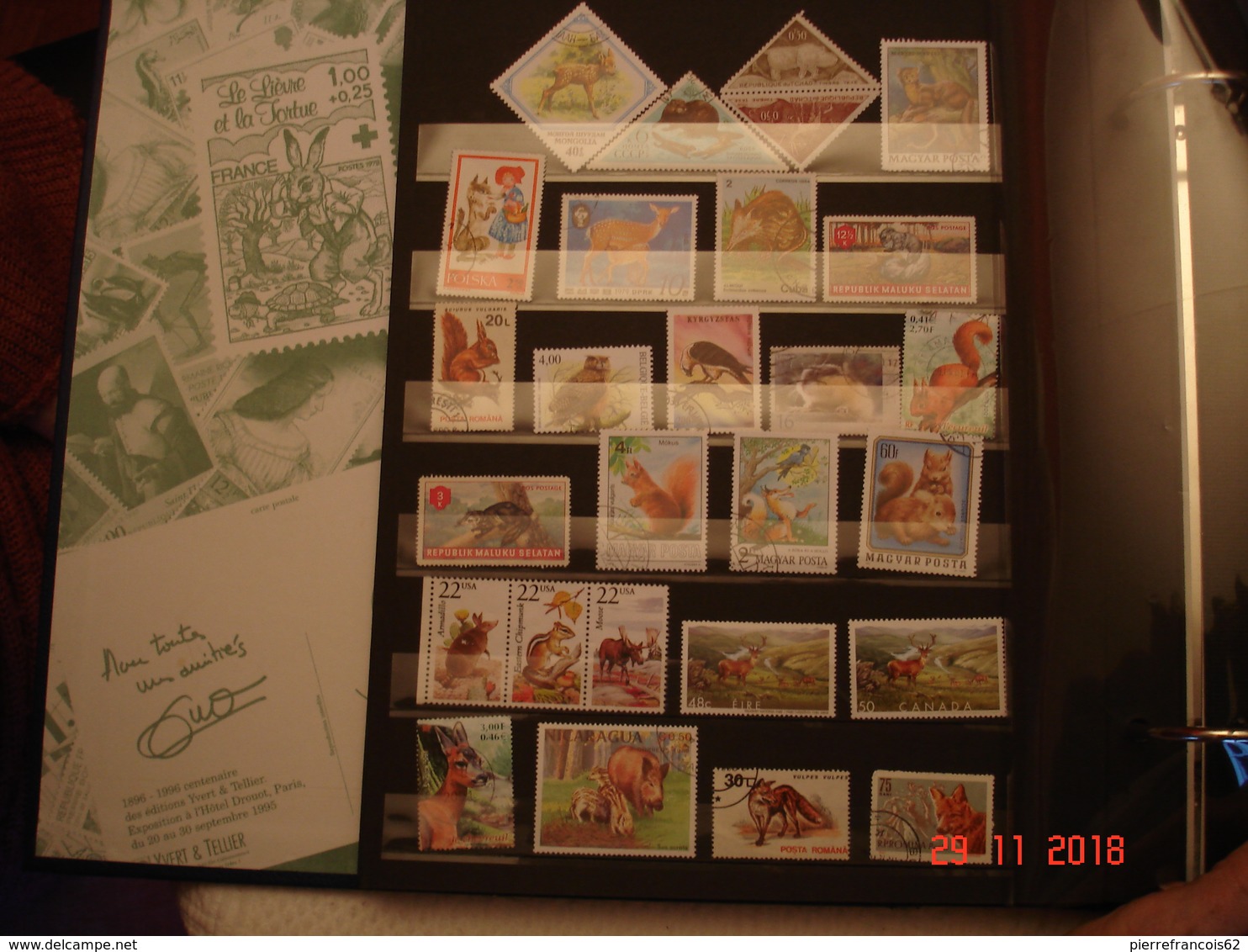 BEL ALBUM CONTENANT COLLECTION DE TIMBRES NEUFS ET OBLITERES SUR LES ANIMAUX ( ferme et foret)