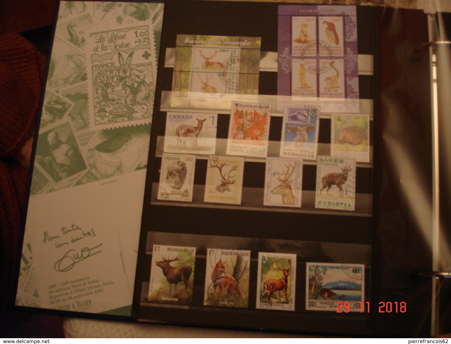 BEL ALBUM CONTENANT COLLECTION DE TIMBRES NEUFS ET OBLITERES SUR LES ANIMAUX ( ferme et foret)