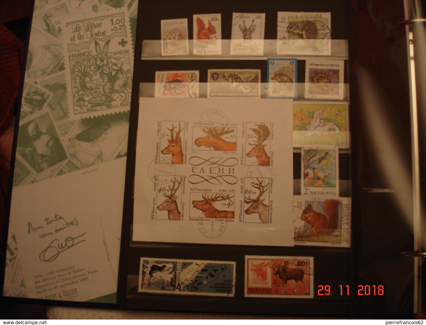 BEL ALBUM CONTENANT COLLECTION DE TIMBRES NEUFS ET OBLITERES SUR LES ANIMAUX ( ferme et foret)