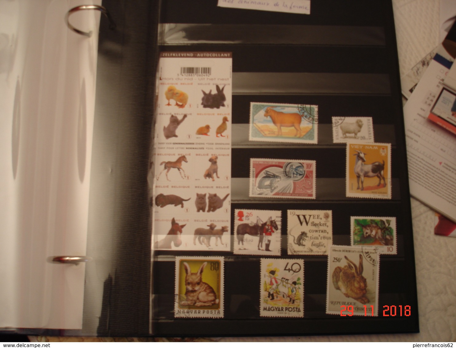 BEL ALBUM CONTENANT COLLECTION DE TIMBRES NEUFS ET OBLITERES SUR LES ANIMAUX ( ferme et foret)