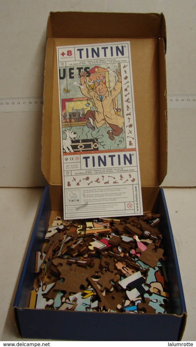 Jeux. 16. Puzzle Tintin Et Les Jouets.  En Bois De 140 Pièces  Numéroté 0790/1000.Complet Et Impeccable. - Puzzles