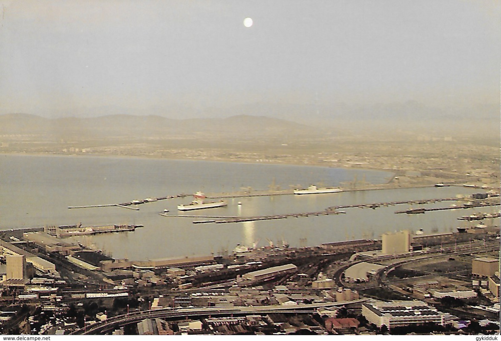 24) VIEW OF SHIPS & SEA AS MOON RISES OVER TABLE MOUNTAIN, CAPE TOWN, SOUTH AFRICA. - South Africa